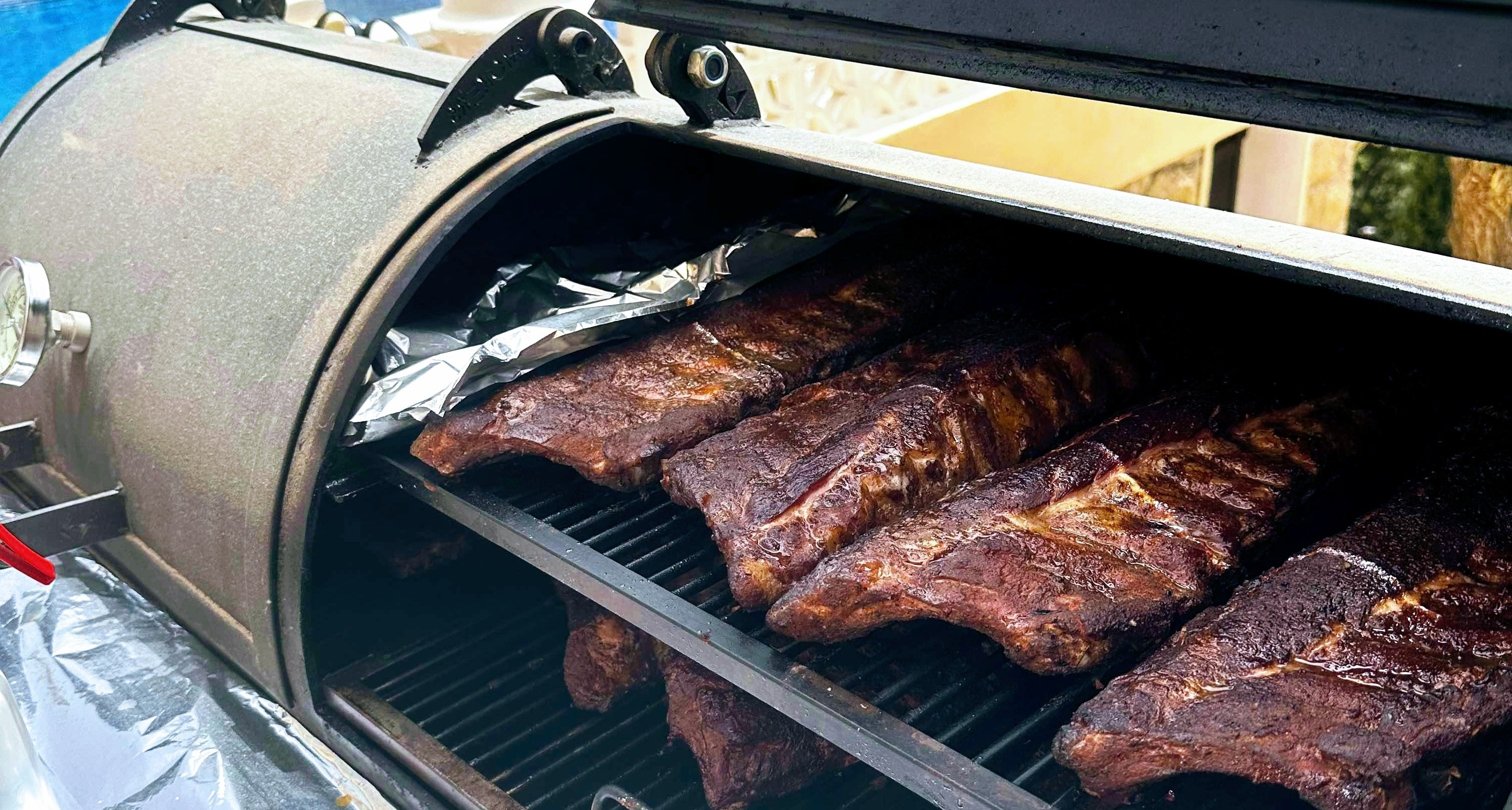 Barbecue smoker with crisp ribs and briskets.